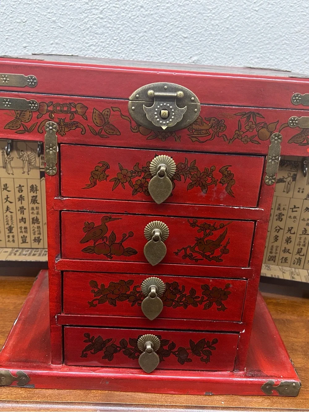 vintage Chinese-style red lacquered wooden jewelry chest ornate brass-toned